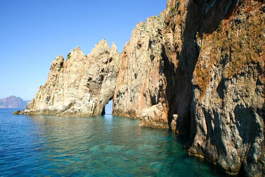 Ajaccio/Porticcio: Scandola Nature Reserve Guided Boat Tour - Calanche de Piana, red granite at close range