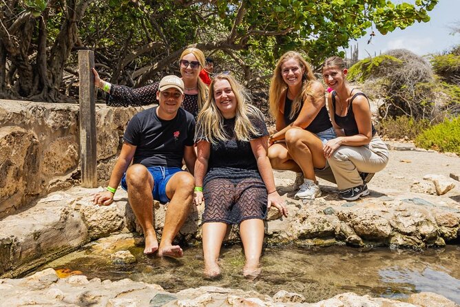 Aruba National Park Tour with Natural Pool & Baby Beach Snorkel - San Nicolas murals add a local note