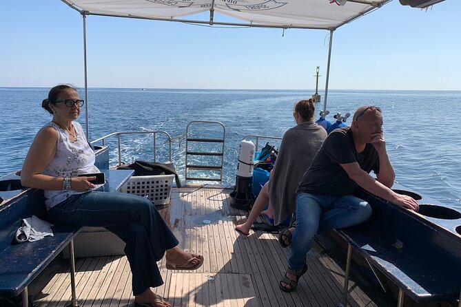 Catania: Cyclops Islands & Timpa Nature Reserve Boat Tour - Stop one: the Cyclops Islands near Aci Trezza