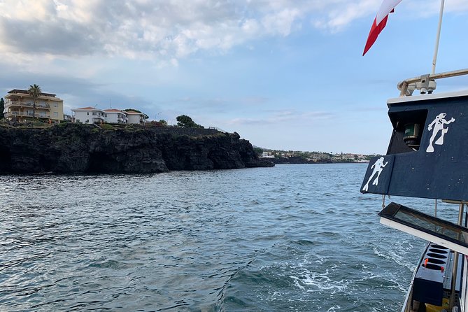 Catania: Cyclops Islands & Timpa Nature Reserve Boat Tour - Leaving Aci Castello on the 13-meter boat