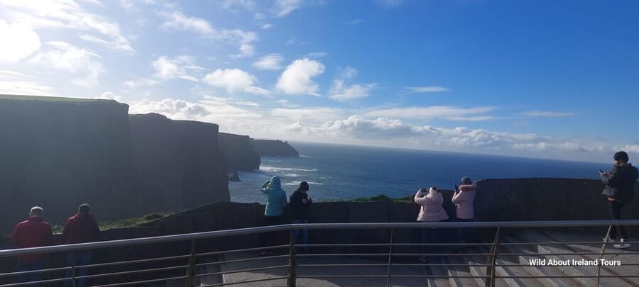 Cliffs of Moher and National Park Private Limousine Tour - Dunguaire Castle, Kinvara, and the route’s human stories