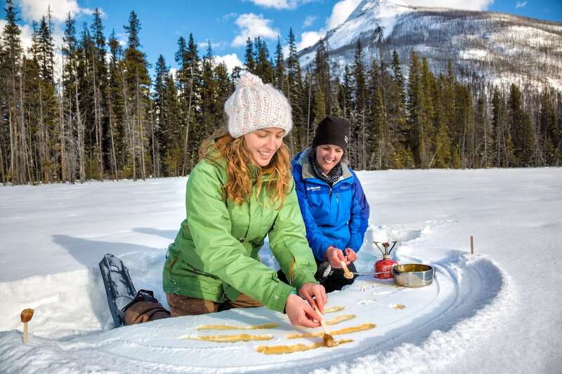 From Banff: Snowshoeing Tour in Kootenay National Park - Crossing the frozen Vermilion River