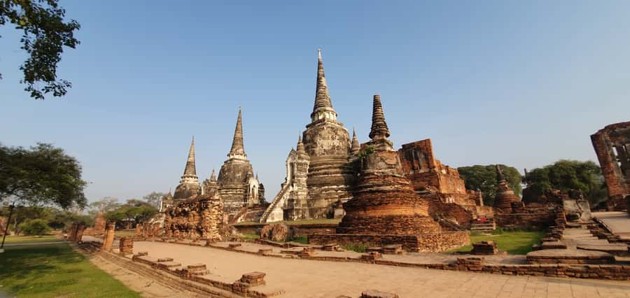 From Bangkok: Ayutthaya & Khao Yai National Park Day Trip - Wat Mahathat and the banyan tree Buddha