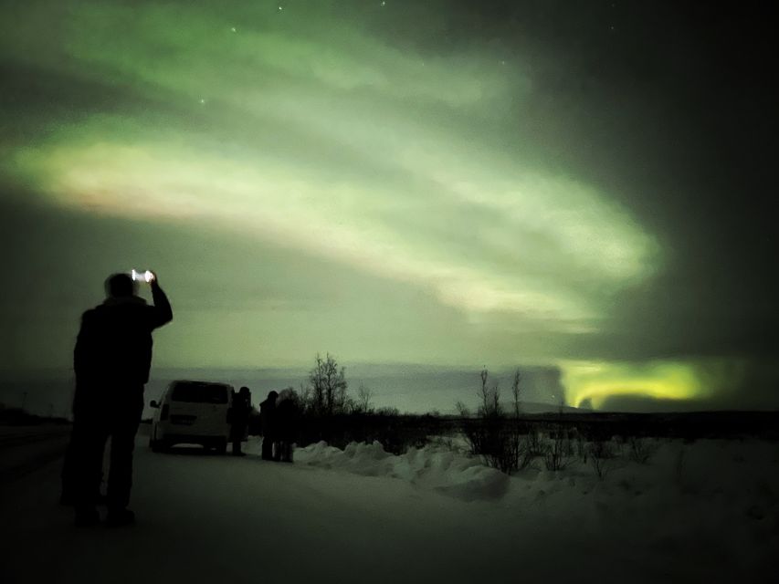 From Kiruna: Abisko National Park Northern Lights Tour - Walking near Abisko Canyon at night