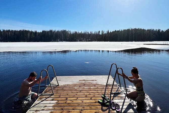 National Park Hike & Finnish Smoke Sauna Experience with Campfire Lunch - A campfire lunch beside the water
