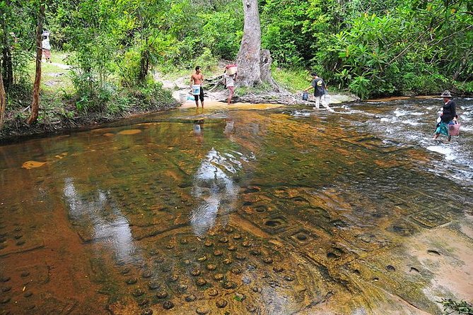 Phnom Kulen Waterfall National Park from Siem Reap - The Thousand Lingas and the riverbed carvings