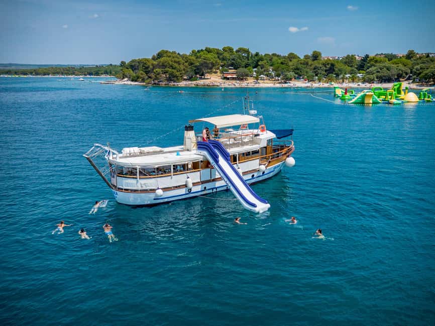 Pula: National Park Brijuni, 2 swimming stops, lunch, drinks - Leaving Pula through the old Austro-Hungarian port