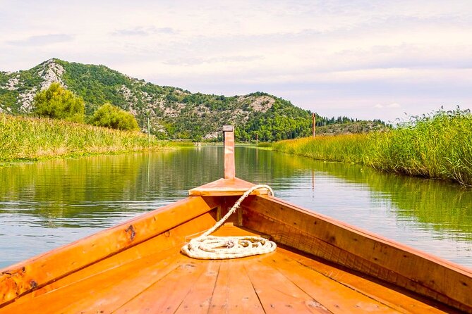 Skadar Lake National Park: Guided Boat Tour to Kom Monastery - Wine, priganice, and a quiet stop at Kamenik