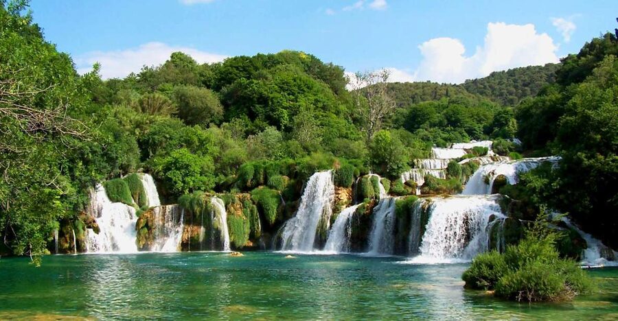Split/Trogir: Krka National Park Day Trip with Wine Tasting - The Krka river boat to Skradin